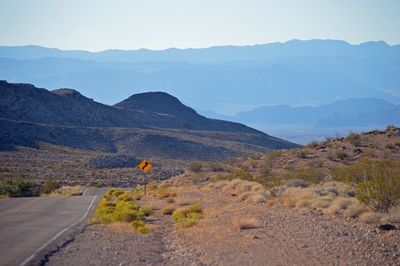 Landscape with mountain range in background