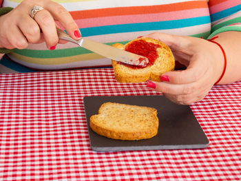 Midsection of woman preparing food