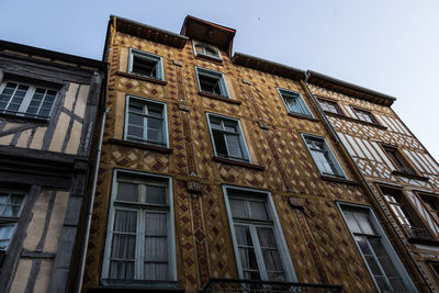 Low angle view of old building against sky