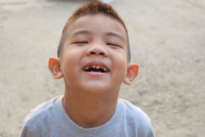 Close-up portrait of smiling boy