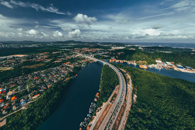 High angle view of city and buildings against sky