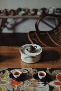 High angle view of teapot on table