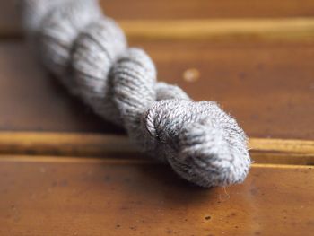 High angle view of wool on wooden table
