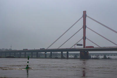 Bridge over river against sky