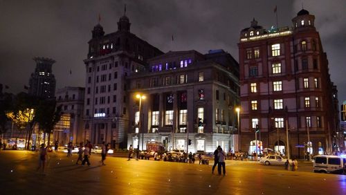 Buildings in city at night