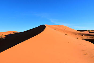 Scenic view of desert against sky