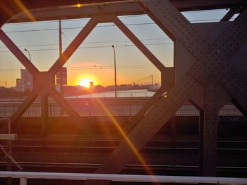 Sunlight streaming through window during sunset