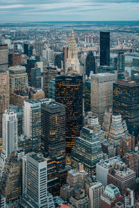 High angle view of modern buildings in city against sky