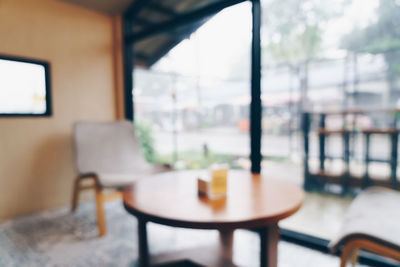 Empty chairs and table in restaurant