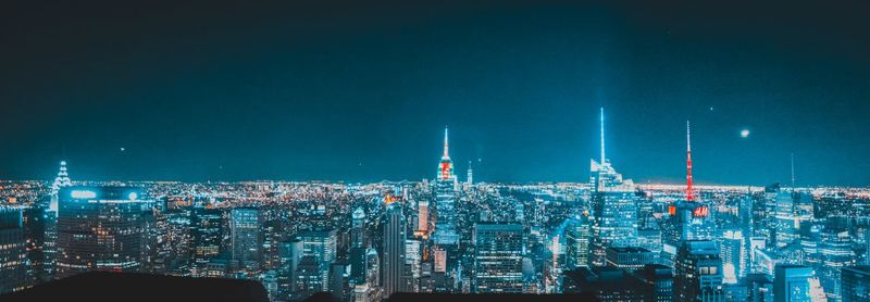 High angle view of illuminated buildings at night