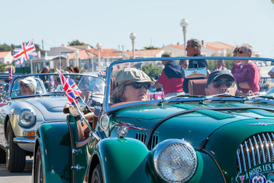 People sitting in car