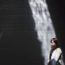 Close-up of woman standing in pond