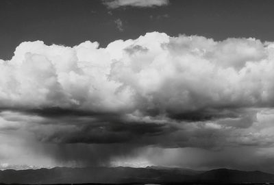 Scenic view of clouds over mountain