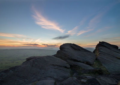 Scenic view of landscape against sky during sunset