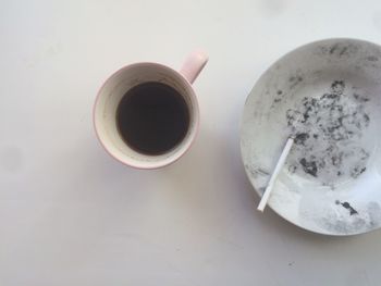 High angle view of coffee cup on table