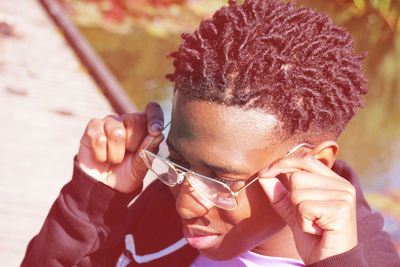 Close-up of young man wearing eyeglasses