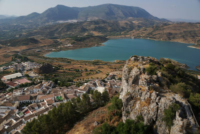 High angle view of buildings and mountains against sky