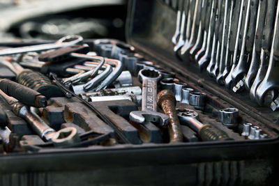 Close-up of tools in container