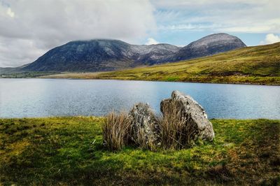  landscape scenery of lough inagh with mountains in the background at connemara, galway, ireland