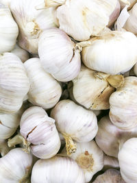 Full frame shot of garlic for sale at market