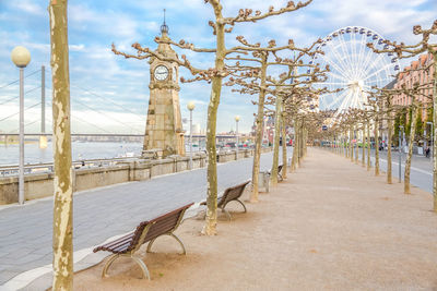 View of empty chairs at amusement park