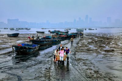 People on boat in sea