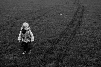 Full length of woman on field