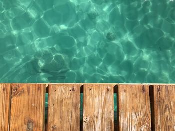 High angle view of swimming pool by sea