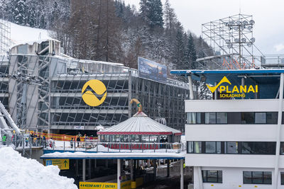 Information sign on building during winter