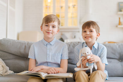 Teach your child to read book as teenager. caucasian child looking into book