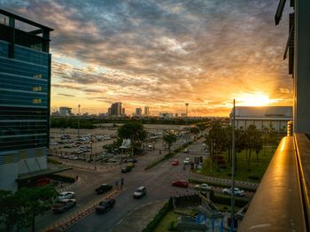 High angle view of city at sunset