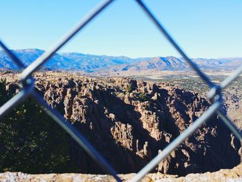 Scenic view of landscape against clear blue sky