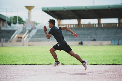 Full length of man running