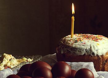 Close-up of food on table against black background