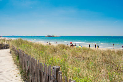 Scenic view of beach against sky