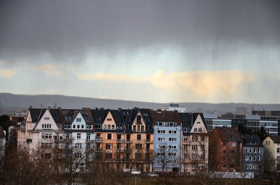 Buildings in city against sky