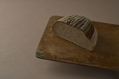 High angle view of bread on cutting board