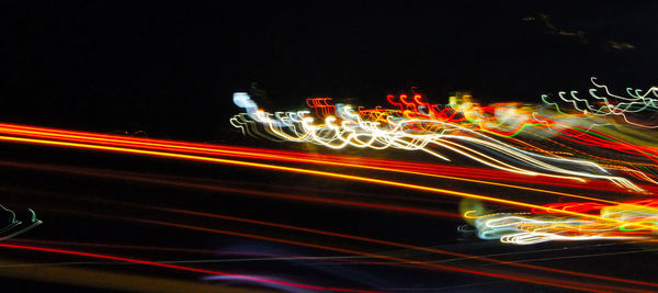 Light trails on road at night