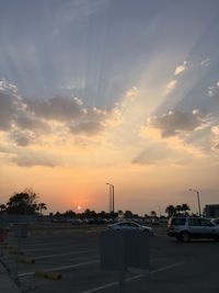 City against sky during sunset