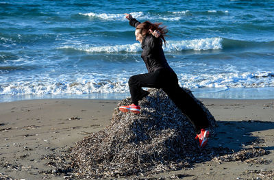 Full length of man on beach