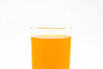 Close-up of drink against white background