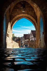 Surface level of old buildings against sky