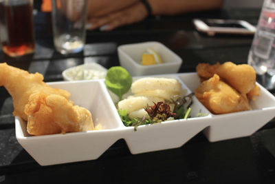 Close-up of food served on table