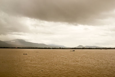 Scenic view of land against sky