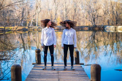 Women standing in lake