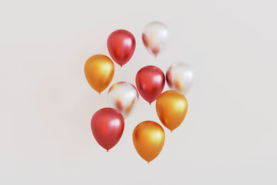 Close-up of balloons against white background