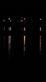 Reflection of illuminated buildings in water