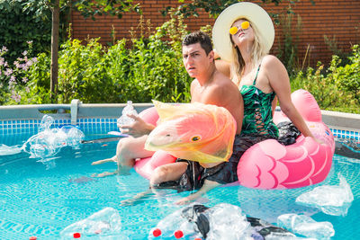 People swimming in pool