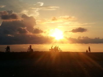 Scenic view of landscape at sunset