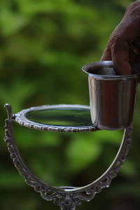 Close-up of hand holding water